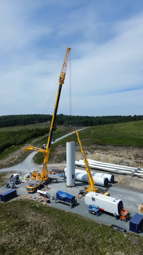 Cranes Lifting Tower Section Portrait